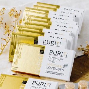 Puriti Manuka Honey Lozenges UMF 12+ box of 8 lozenges, 12 boxes stacked together